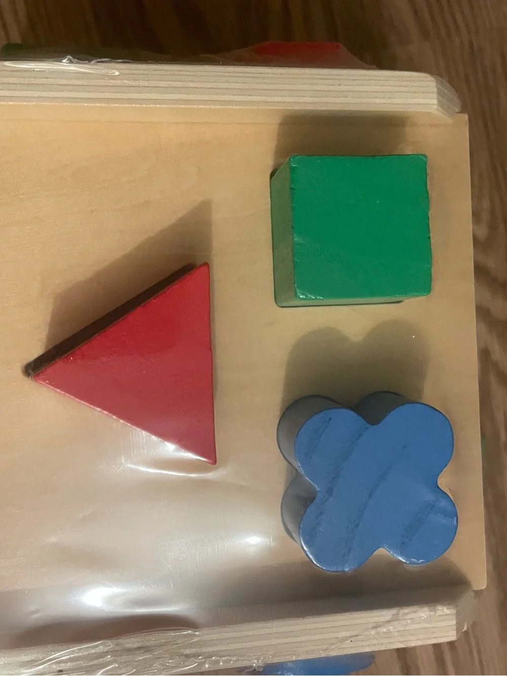 Melissa & Doug Shape Sorting Cube - Red, Blue, Yellow, Green